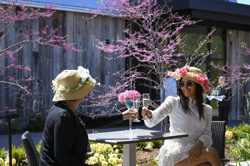 Guests wearing spring bonnets at the Bonnet Luncheon during Niagara-on-the-Lake In Bloom festival