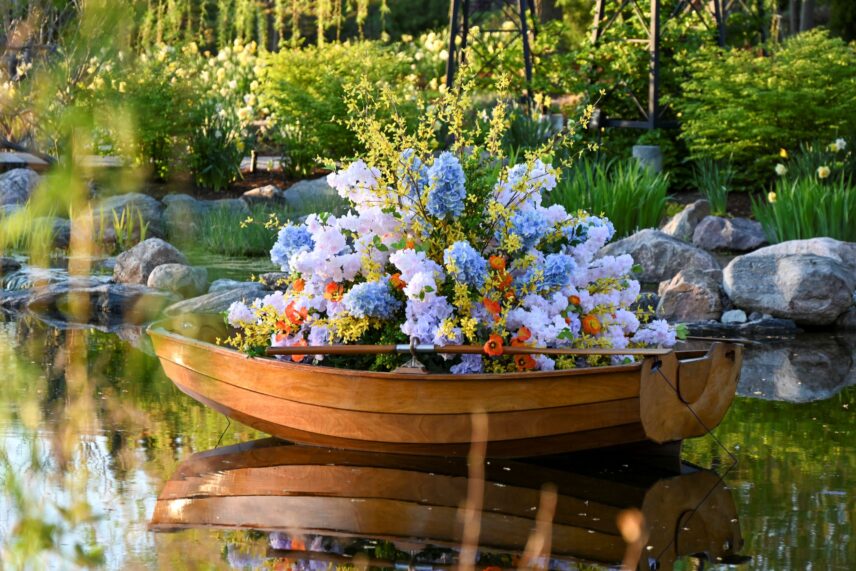 Niagara-on-the-Lake In Bloom floral displays in a boat in the Gardens at Pillar and Post