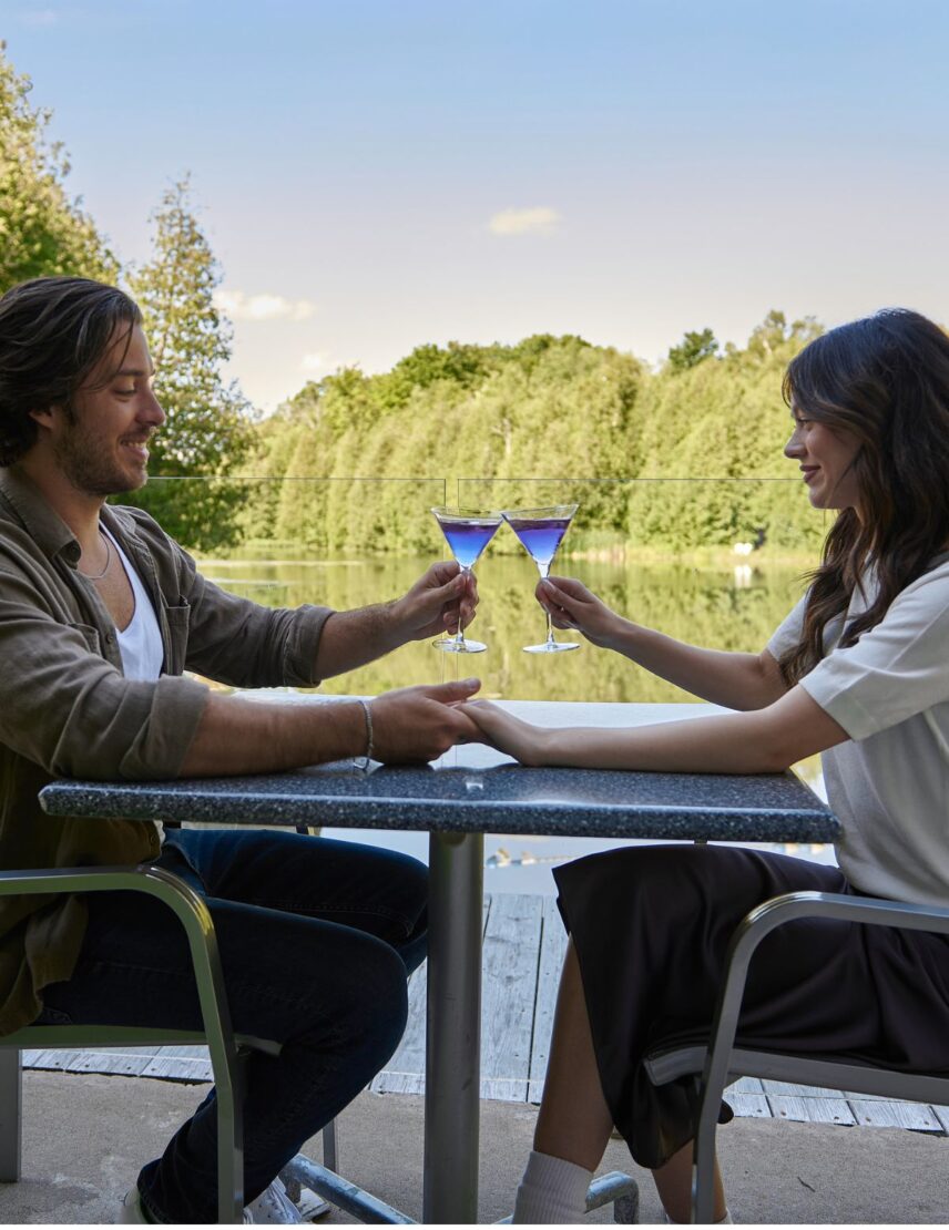 A couple celebrates a long weekend on the patio at Millcroft Inn & Spa near Caledon, Ontario.