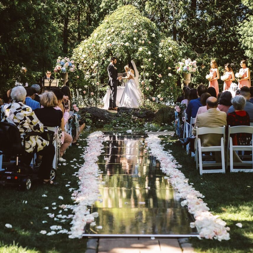 mirrored wedding aisle at Millcroft Inn & Spa reflecting floral arrangements and ceremony décor
