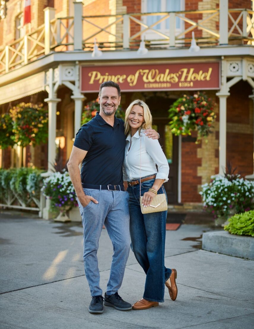 A couple poses outside of the romantic Prince of Wales Hotel in Niagara-on-the-Lake.