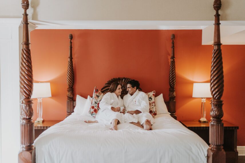Couple relaxing in a luxury suite at Queen’s Landing hotel in Niagara-on-the-Lake wine country