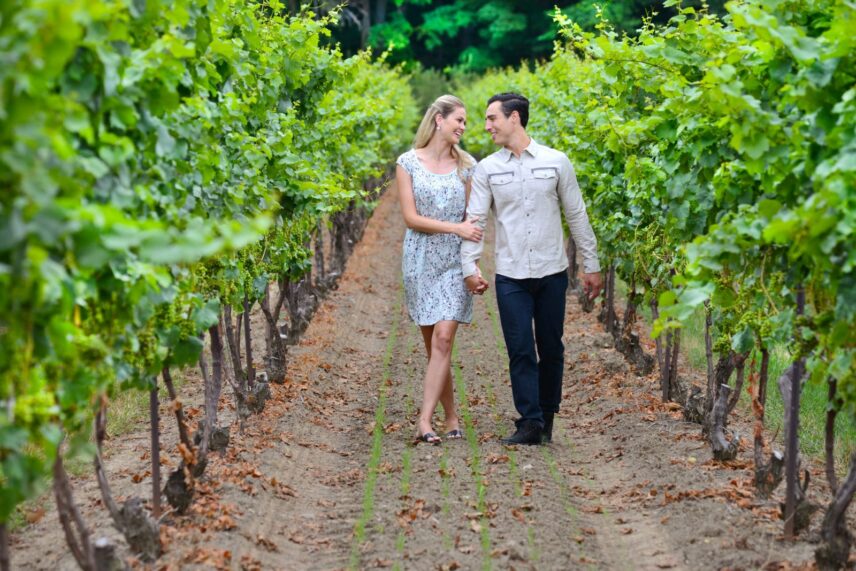 Couple exploring vineyards in the Niagara Benchlands in the summer