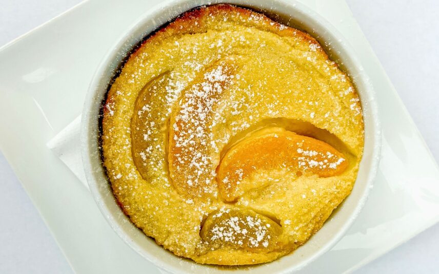 Peach Clafoutis recipe pairs a silky, custard-like base with sweet, ripe peaches for a dessert that's both rustic and refined.