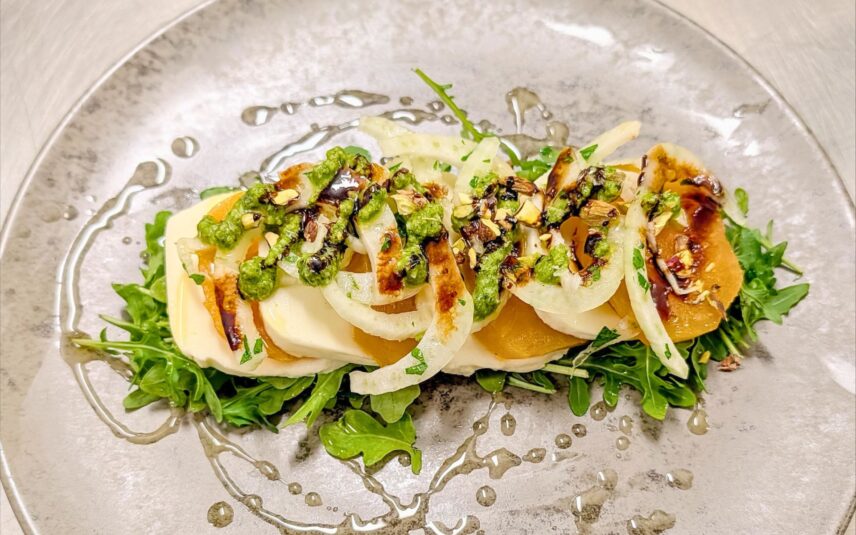 Golden Beet Caprese recipe pairs roasted golden beets with creamy mozzarella and a fragrant pistachio pesto.