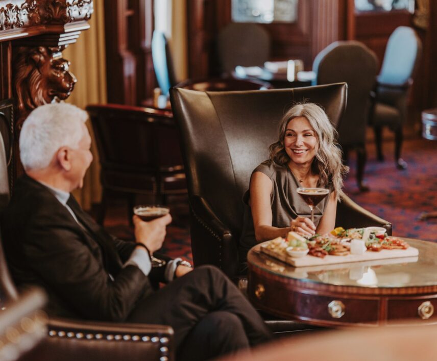 Couple in Chruchill Lounge at Prince of Wales enjoying Niagara Icewine cocktails.