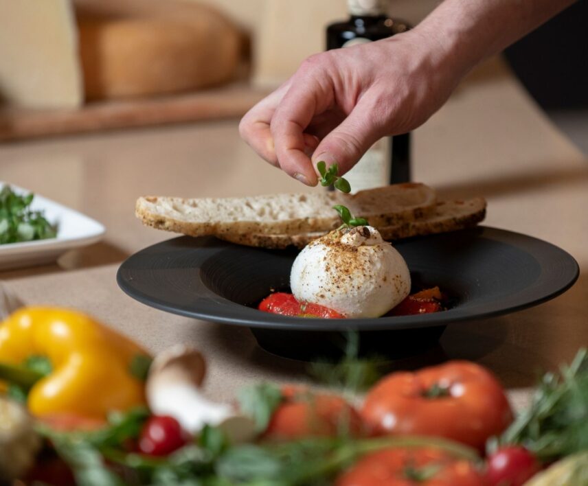 Enjoy authentic Italian food at La Regina Restaurant in Queen's Landing Hotel