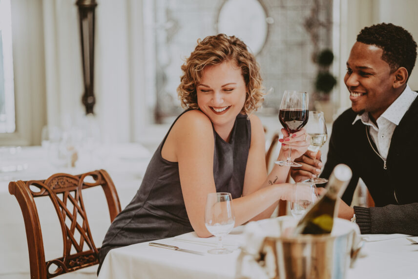 Couple enjoying wine during a romantic getaway at Prince of Wales in Niagara-on-the-Lake