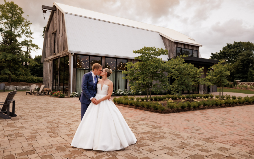 Wedding couple outside of The Barn in The Gardens by Pillar & Post in Niagara-on-the-Lake.