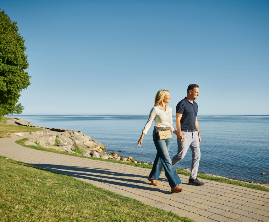 Couple walking on lakeside trail in Niagara-on-the-Lake