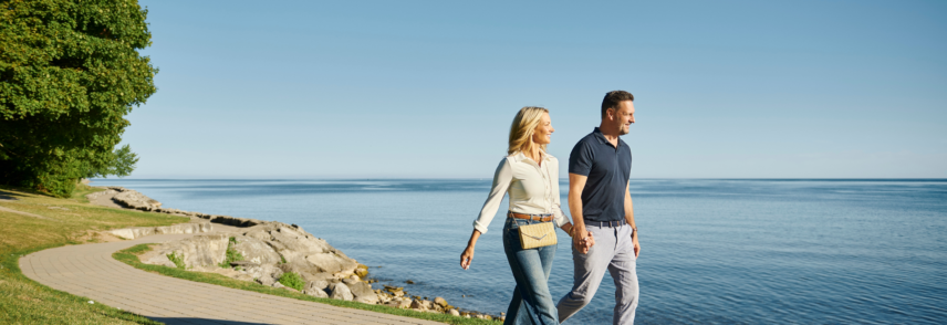 Couple walking on lakeside trail in Niagara-on-the-Lake