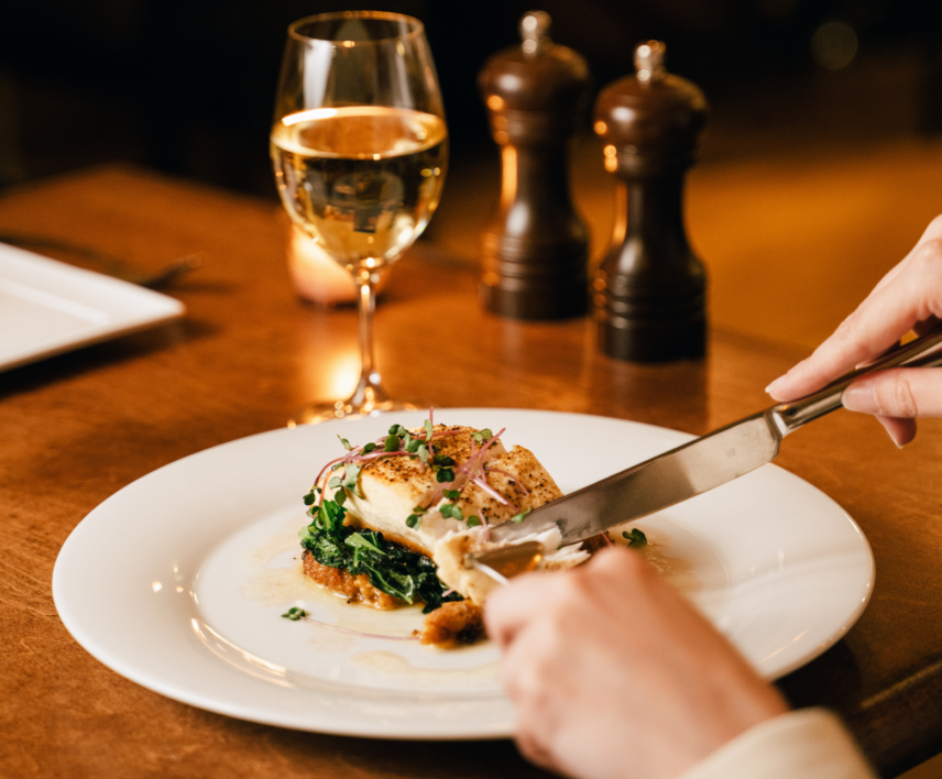 Salmon dish with white wine at Zees Grill in The Shaw Club in downtown Niagara-on-the-Lake