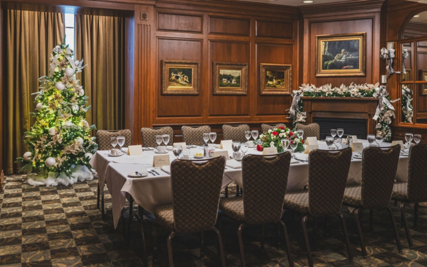 Holiday party event set for a group dinner in the Olde Library venue space at Pillar and Post in Niagara-on-the-Lake .
